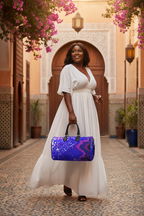Electric Blue Leaf Duffle – White Outfit Morocco