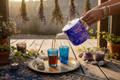 Electric Blue Leaf Teapot – Pouring into Moroccan Glasses