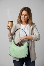 Green Leaf Curve Hobo Bag Forearm Studio Coffee and Keys Mockup
