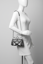 Hot Metal Flat Frame Bag Hanging from Mannequin Arm Studio Mockup
